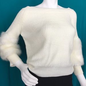 White sweater with white faux fur arms